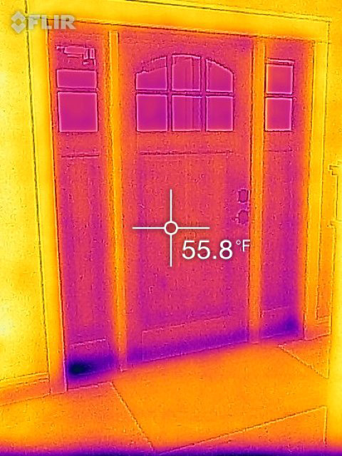 Thermal image of air leakage from the bottom of the front door in the living room.